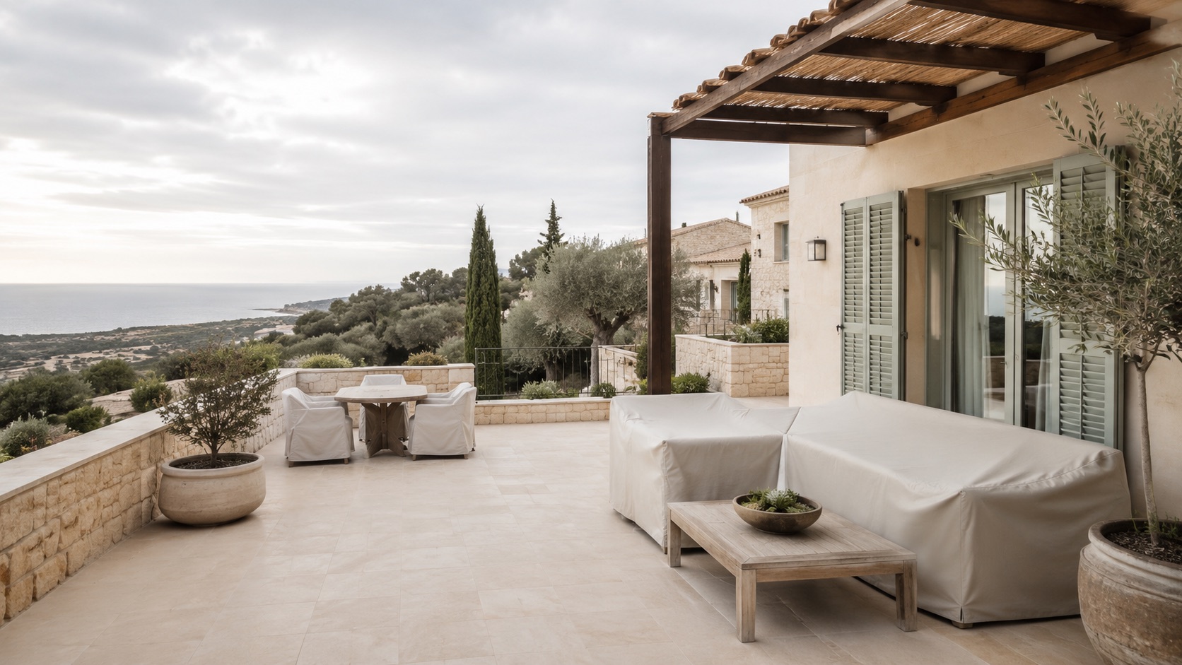 Covered outdoor terrace showing off-season property readiness and winter care